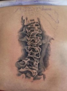tattoo of scoliotic spine